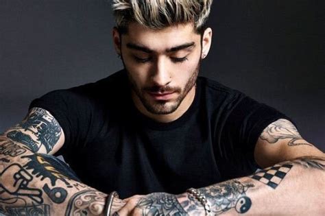 Zayn malik tattoos perrie edwards face on his arm metro news. Zayn Malik's 46 Tattoos & Their Meanings - Body Art Guru