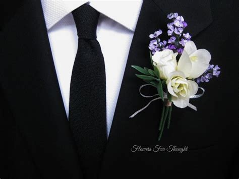 lavender rose boutonniere groomsmen lapel pin cream and purple wedding flowers