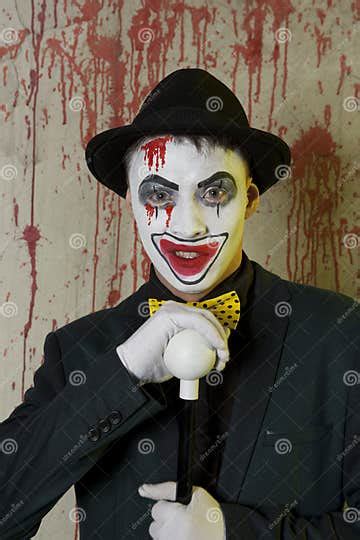 Evil Clown Wearing A Bowler Hat On Wall Stock Image Image Of Horror