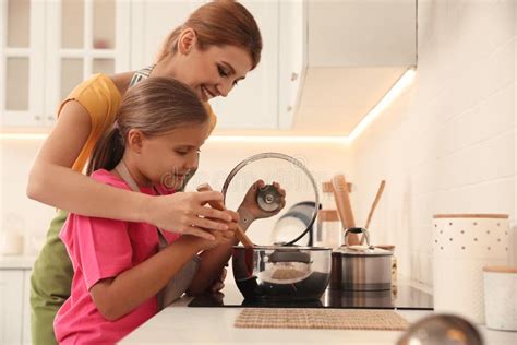 Mother And Daughter Cooking In Kitchen Stock Image Image Of Home Ingredient 175215825