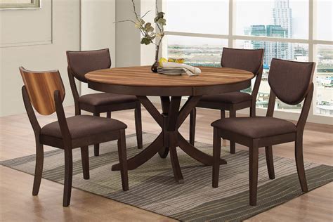 Available in a range of sizes, our kitchen and dining room tables can seat as few or as many as you like—from the cozy table tucked in the corner of your kitchen to the extension table with leaf that easily seats up to ten guests. Turner Round Dining Table + 4 Side Chairs