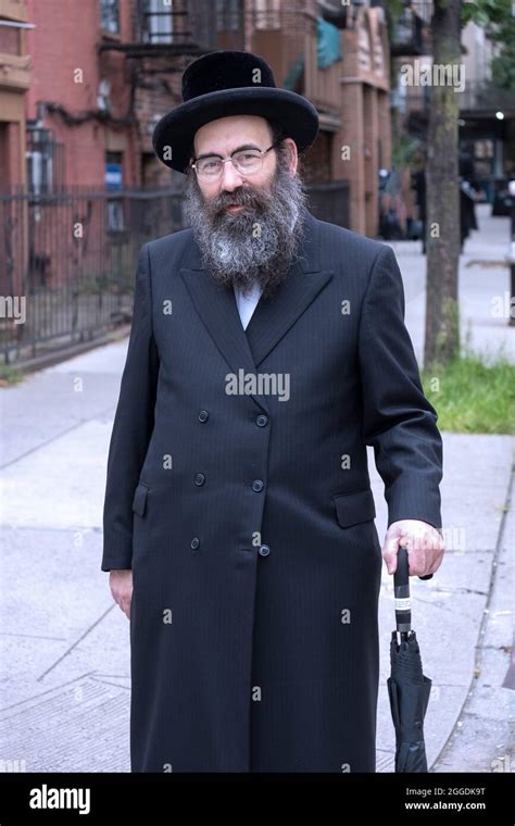 Posed Portrait Of A Hasidic Rabbi On Bedford Avenue And Ross Street In
