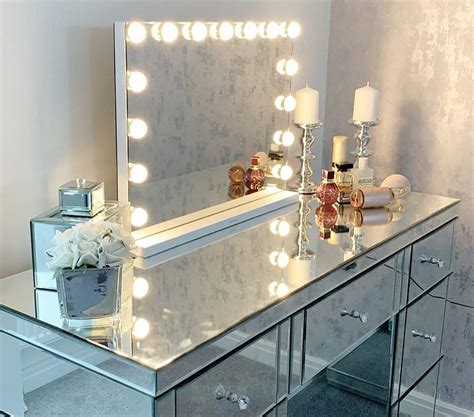 The frameless mirror measures 17x23x5 inches and sits on a white stand. Vanity Makeup Mirror Lights,Hollywood Lighted Dressing ...