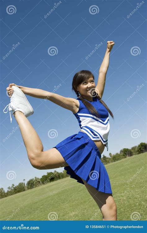 Teenage Cheerleader Stretching Stock Image Image 13584651
