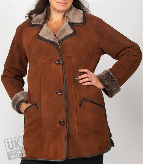 Step out in style and turn heads with our edit of coats and jackets for women. Womens Finest Lambskin Shearling Car Coat - Reina - Dark Tan