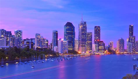 Download Stunning Twilight Skyline Of Brisbane City Wallpaper