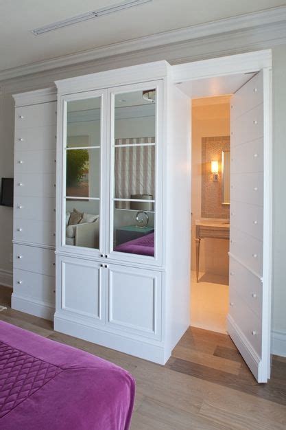 Hidden rooms and designing hidden rooms, panic rooms, and more. Villa Miami home project from Avanzato Design LLC | Porch ...