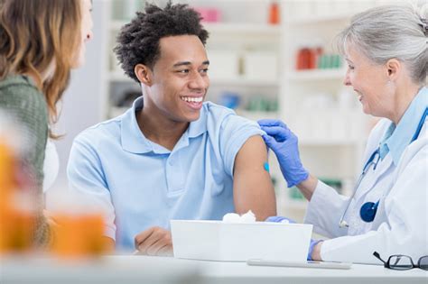On the other end of the spectrum, the list also includes venous thrombosis, a condition where a blood. African American Receives Flu Vaccine Stock Photo ...