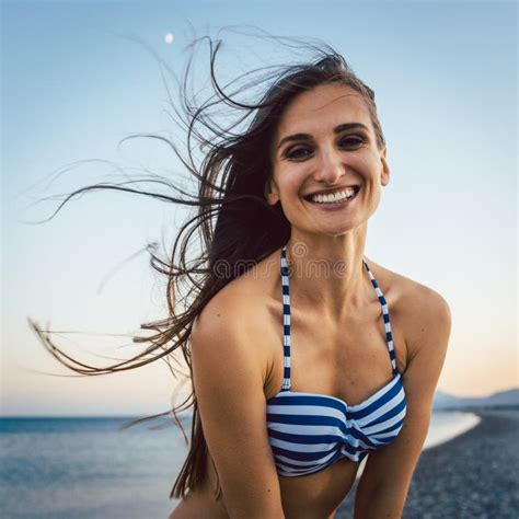 Woman On A Pebble Beach Stock Image Image Of Breeze