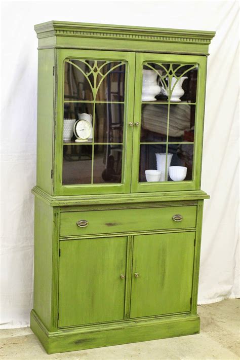 Maybe you would like to learn more about one of these? Laurel's Attic : Boxwood Green China Cabinet - SOLD