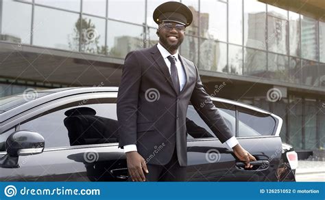 Vip Passenger Taxi Driver Politely Opening Car Door For His Client