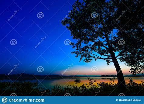 Beautiful Blue Twilight Sky Over Lake At Dawn For Backgroun Stock Image