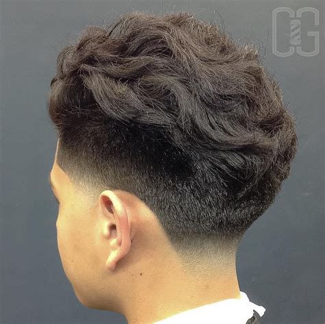 It blends the best features of the taper and fade haircuts for a clean masculine look. Hispanic Low Fade Haircut Curly Hair - bpatello