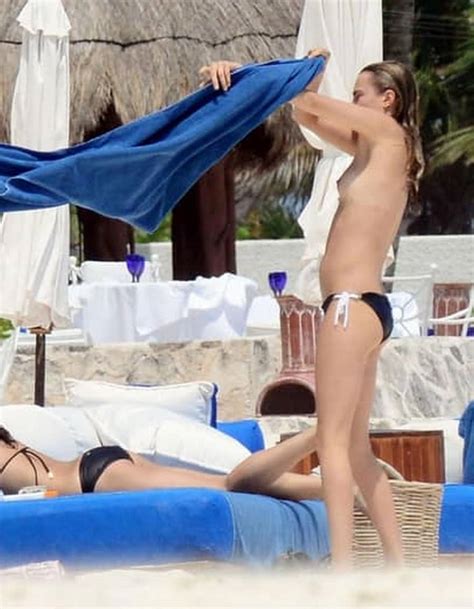 Cara Delevingne Topless With Her Girlfriend Michelle Rodriguez On A Beach