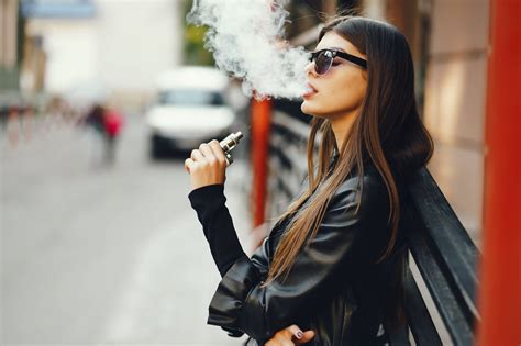 Woman Smoking An E Cigarette Study Finds