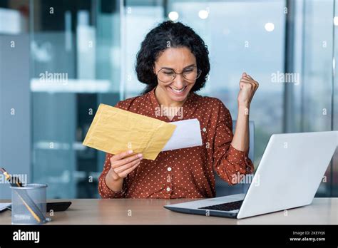 Happy Hispanic Business Woman Received Letter From Bank Notification In
