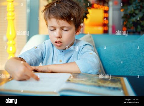 Preschooler Boy Reading Book Stock Photo Alamy