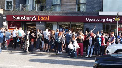 scores hold mass gay kiss in at sainsbury s after same sex couple told off by security itv news
