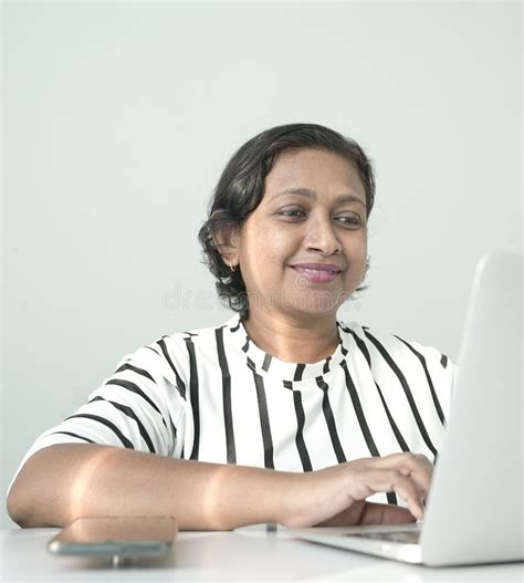 Happy Indian Ethnic Business Woman Smiling And Typing On Her Laptop Stock Image Image Of Copy