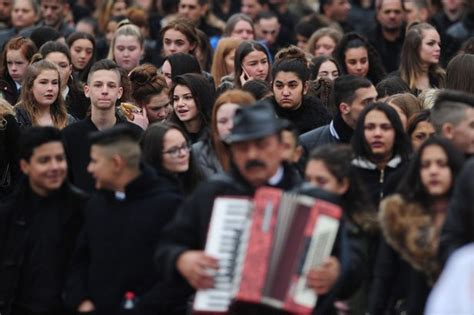 Emotional Scenes As Hundreds Line Streets For Funeral Of Cousins Killed