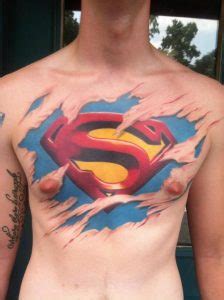 Super man ripped skin logo tattoo on chest. Superman Chest Tattoo Designs, Ideas and Meaning | Tattoos ...