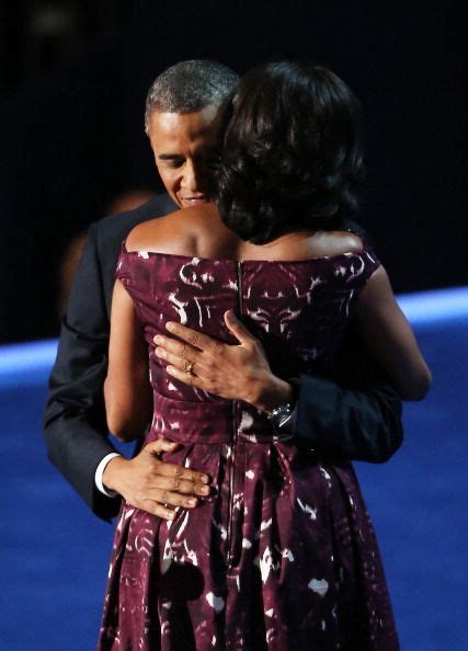 The Obamas Embracing At The Democratic Convention 9612 Barack And Michelle Barack Obama