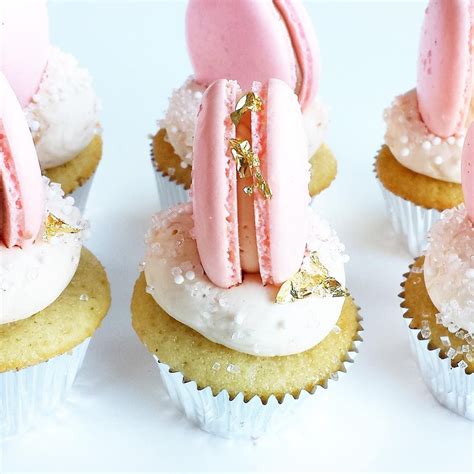 Cupcakes With Pink Frosting And Gold Decorations
