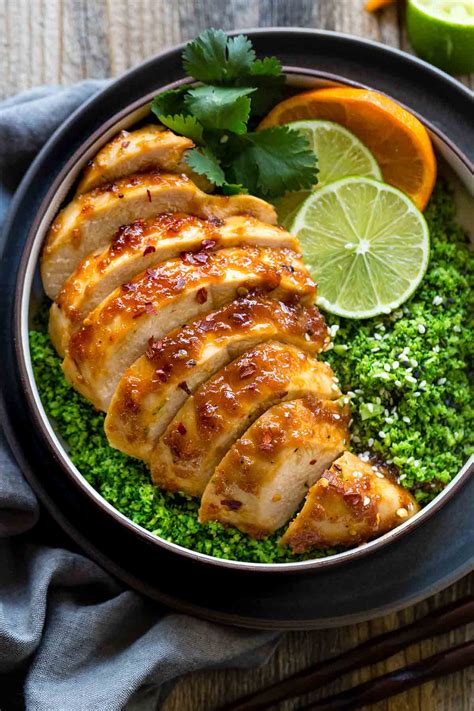 This colorful cheesy chicken and rice recipe is packed with flavor. Orange Chicken and Broccoli Rice Bowls - Jessica Gavin