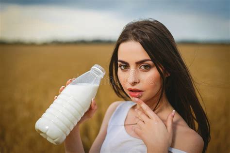 Beautiful Woman Is Drinking Milk In Countryside Stock Image Image Of Dairy Beautiful