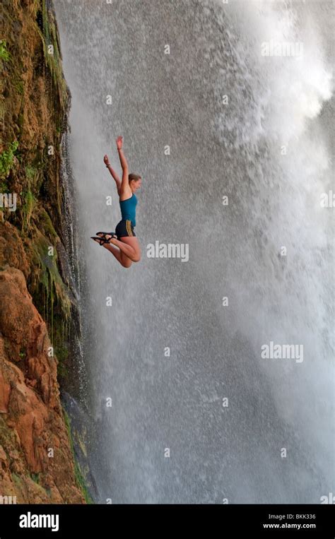 Jumping From A Ledge Into The Plunge Pool Below Havasu Falls Stock