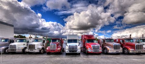 Hdr Image Of Semi Trucks Lined Up On A Parking Lot Stock Photo Adobe