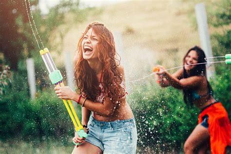 670 Adult Water Gun Fight Stock Photos Pictures And Royalty Free Images