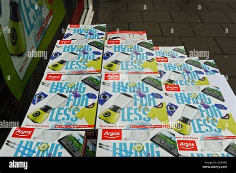 Argos Retail Shop Catalogues In A Pile Outside A Store In Brighton Uk