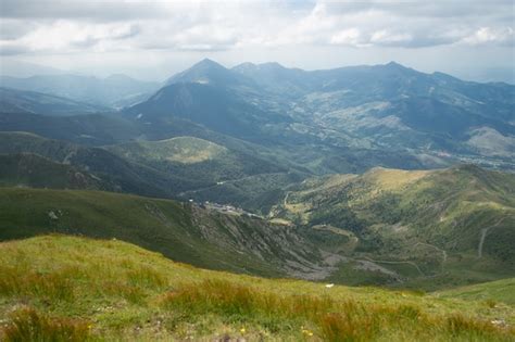 Free Photo Landscape Of Hills Covered In Greenery With Rocky