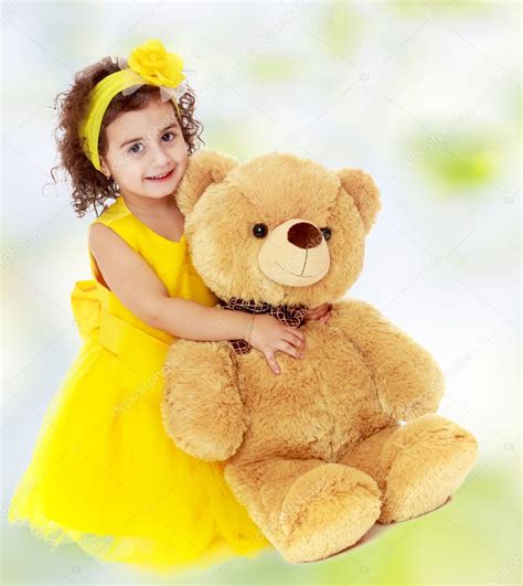 Little Girl Hugging Teddy Bear Stock Photo By ©lotosfoto1 127890658