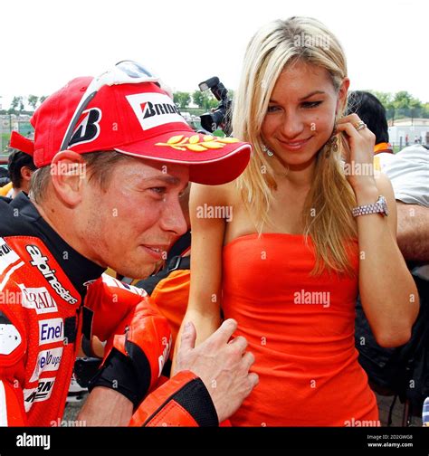 Ducati Motogp Rider Casey Stoner L Of Australia Reacts As His Wife Adriana Smiles After The