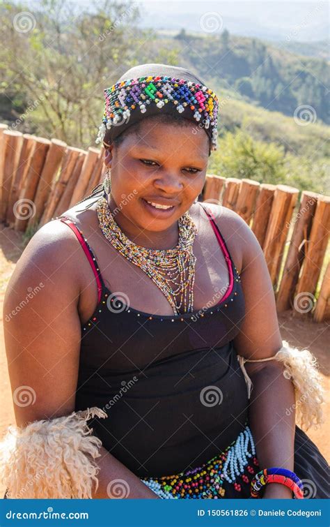 Portrait Of An African Zulu Woman In Traditional Dress Hat Smiling