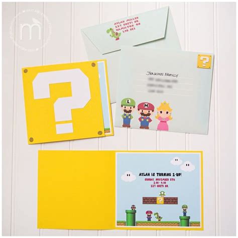 An Image Of Mario Birthday Party With Envelopes And Stationery Items On