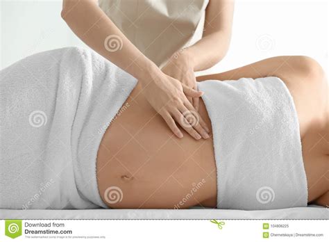Young Beautiful Pregnant Woman Having Massage Stock Image