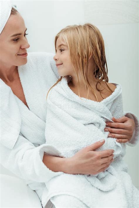 Mother Looking At Cute And Wet Daughter In Bathroom Stock Image Image
