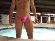 Hot Guy Showing Off His Huge Pink Thong Bulge At Public Swimming Pool