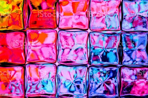 Abstract Textured Background Of A Multicolored Glass Block Wall Stock