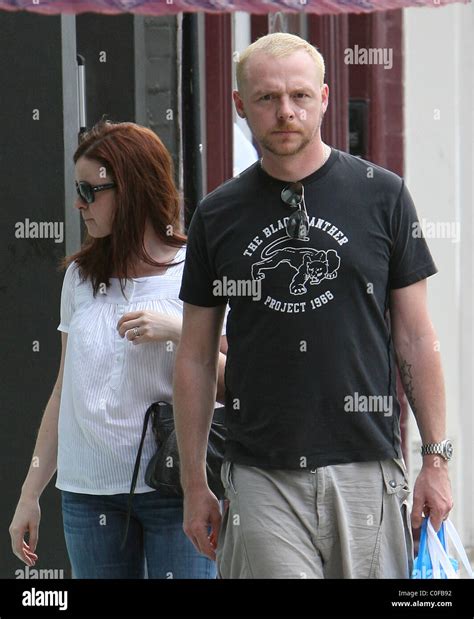 Simon Pegg And His Wife Maureen Mccann Do A Spot Of Shopping In Stock
