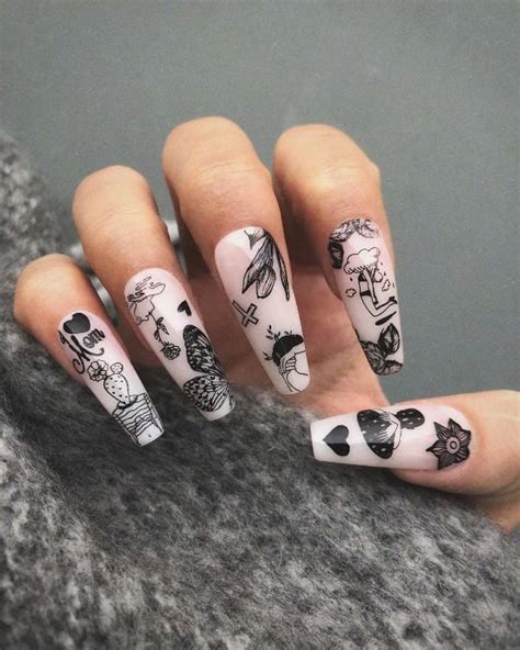 30 Photos Of The Coolest Tattoo Nail Designs That Are Trendy In 2024