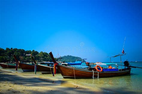 Beautiful Seascape Of The Beach In Thailand And Thai Traditional Boats