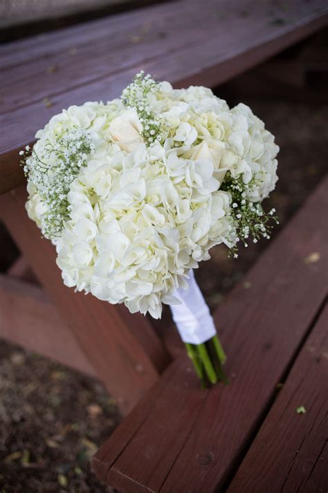 This light and airy bloom, typically used as filler, makes a decorate the entire wedding party in baby's breath by incorporating matching bridesmaid bouquets, as well. DIY White Hydrangea and Baby's Breath Bouquet