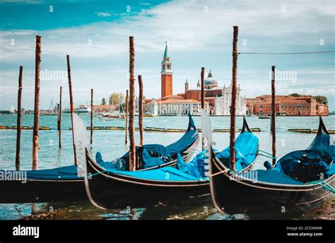 Venice Italy Close Up Of Gondolas And San Giorgio Maggiore Church On