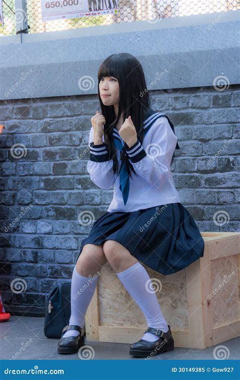 Cute Thai Cosplayer Dresses As Japanese Schoolgirl Posing Editorial Image