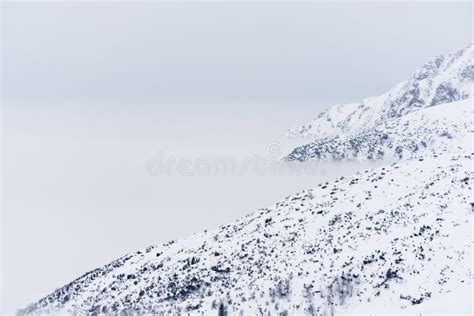 Beautiful Scenery Of Clear White Snowy Mountains And Hills Stock Photo