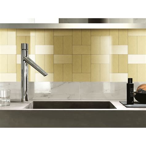 Look at those gorgeous patterns. Brushed Champagne Long Grain Metal Tile, Peel and Stick Backsplash for Kitchen & Bathrooms